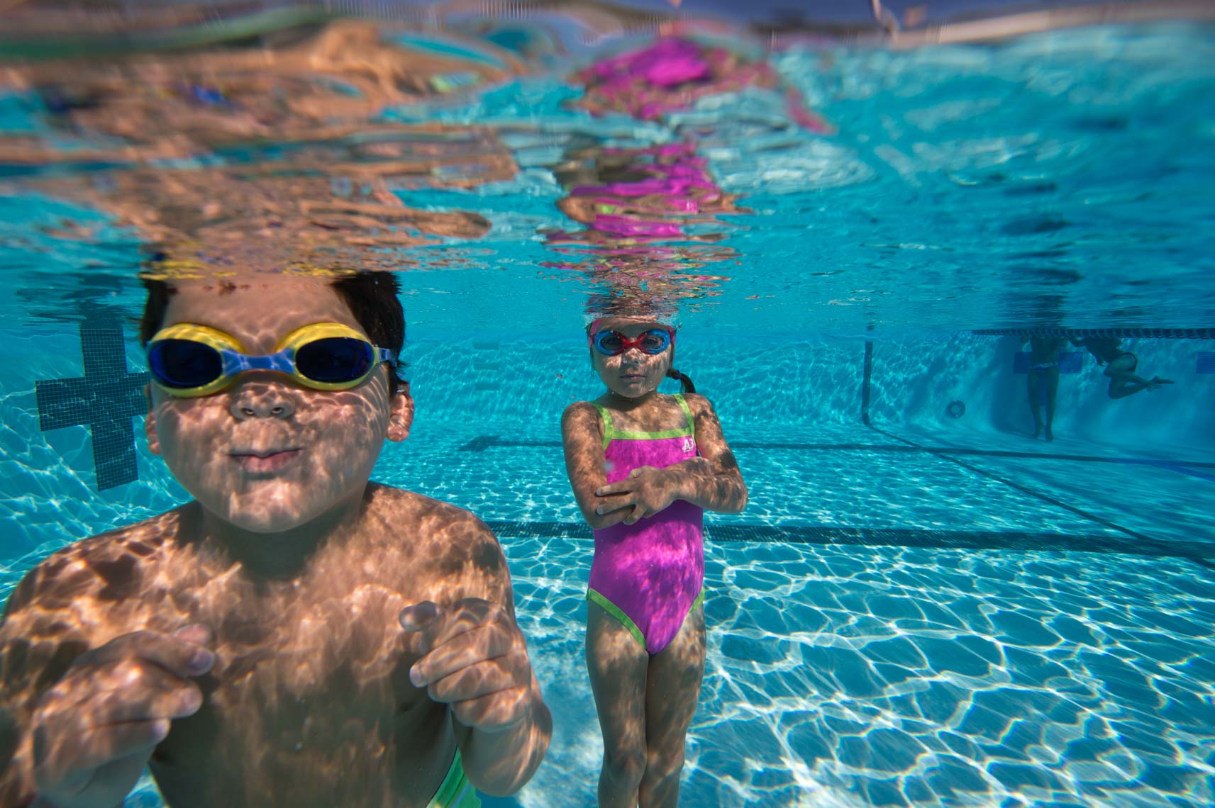 kids underwater swimming